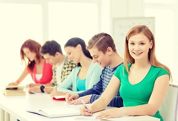 Image showing students with textbooks and books at school