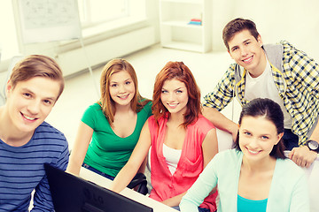 Image showing group of smiling students having discussion