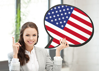 Image showing smiling woman with text bubble of american flag