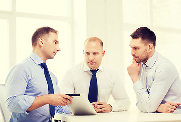 Image showing business team working with tablet pc in office