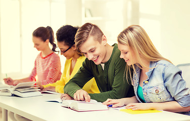 Image showing students with textbooks and books at school