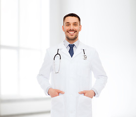 Image showing smiling male doctor with stethoscope