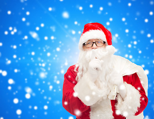 Image showing man in costume of santa claus with bag