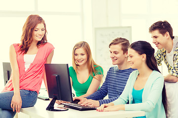 Image showing group of smiling students having discussion