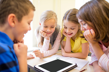 Image showing group of school kids with tablet pc in classroom