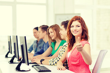 Image showing female student with classmates in computer class