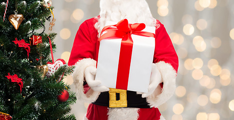 Image showing man in costume of santa claus with gift box