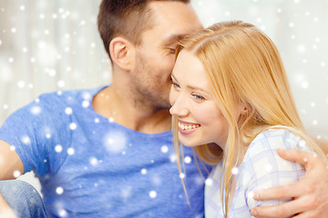 Image showing happy couple hugging at home