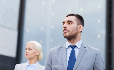 Image showing close up of serious businessmen