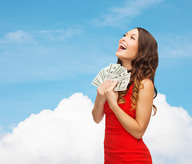 Image showing woman in red dress with us dollar money