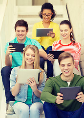 Image showing smiling students with tablet pc computer