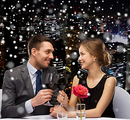 Image showing smiling couple at restaurant