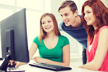 Image showing group of smiling students having discussion