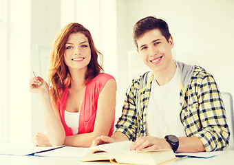 Image showing students with textbooks and books at school