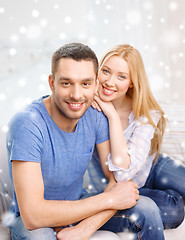 Image showing happy couple hugging at home