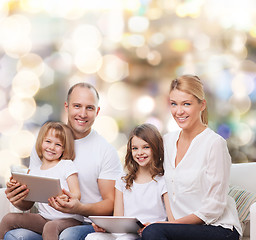 Image showing happy family with tablet pc computers