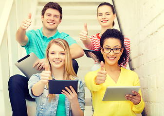 Image showing smiling students with tablet pc computer