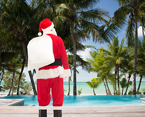 Image showing man in costume of santa claus with bag