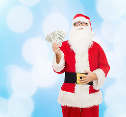 Image showing man in costume of santa claus with dollar money