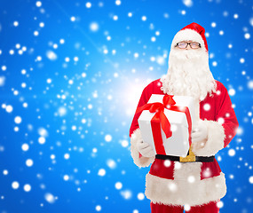 Image showing man in costume of santa claus with gift box