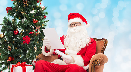 Image showing man in costume of santa claus with letter