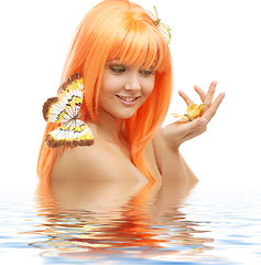 Image showing butterfly girl in water