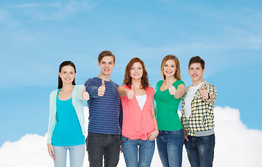 Image showing group of smiling students showing thumbs up