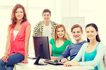 Image showing group of smiling students having discussion