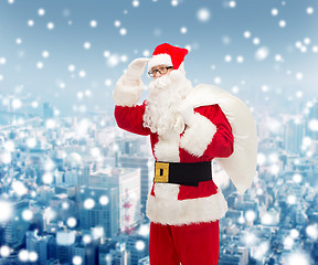 Image showing man in costume of santa claus with bag