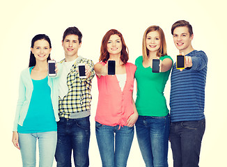 Image showing students showing blank smartphones screens