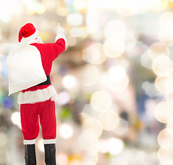 Image showing man in costume of santa claus with bag