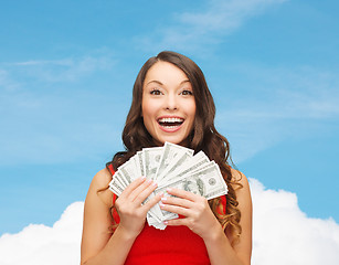 Image showing woman in red dress with us dollar money