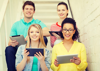 Image showing smiling students with tablet pc computer