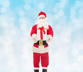 Image showing man in costume of santa claus with gift box