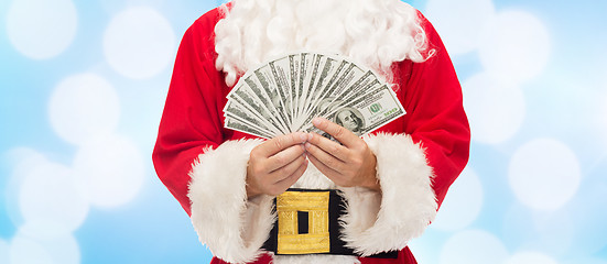 Image showing close up of santa claus with dollar money