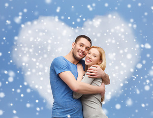 Image showing happy couple hugging outdoors