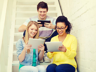 Image showing smiling students with tablet pc computer