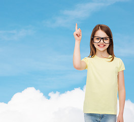 Image showing smiling cute little girl in black eyeglasses