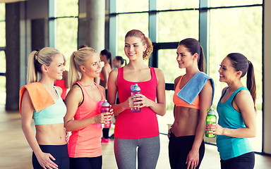 Image showing women with bottles of water in gym