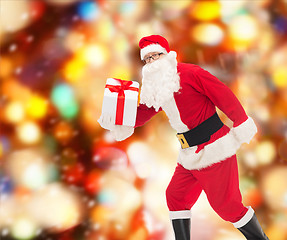 Image showing man in costume of santa claus with gift box