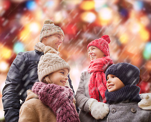 Image showing happy family in winter clothes outdoors