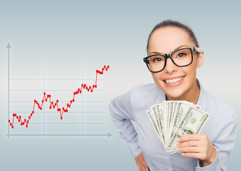 Image showing young businesswoman with dollar cash money