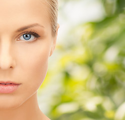 Image showing beautiful young woman half face