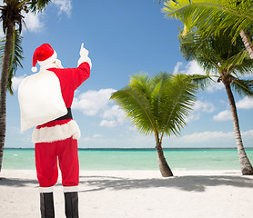 Image showing man in costume of santa claus with bag