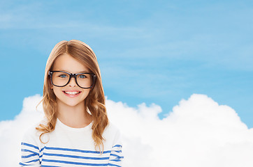 Image showing smiling cute little girl with black eyeglasses