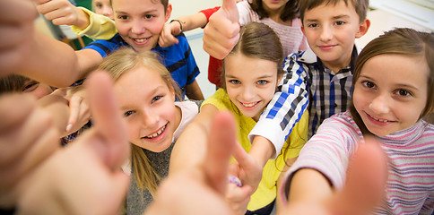 Image showing group of school kids showing thumbs up