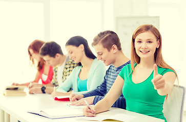 Image showing students with textbooks and books at school