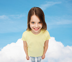 Image showing smiling little girl over green grass background
