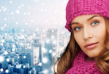 Image showing close up of smiling young woman in winter clothes