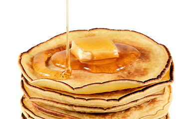 Image showing Pancakes with butter and syrup.